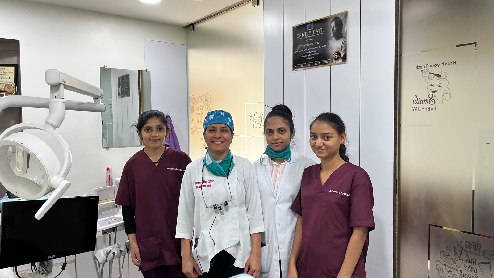 Dr. Deepika Mod with the clinical team inside the operatory